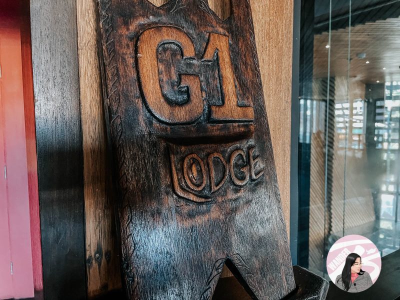 a wooden sculpture with g1 lodge engraved